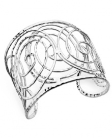 Create an optical illusion. Sequin's captivating cuff bracelet features an intricate swirling pattern in silver tone mixed metal. Approximate diameter: 2-1/2 inches. Create an optical illusion. Sequin's captivating cuff bracelet features an intricate swirling pattern in silver tone mixed metal. Approximate diameter: 2-1/2 inches.