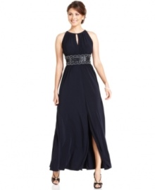 Make a stunning style statement in this petite evening dress from R&M Richards, featuring a sexy keyhole design, beaded empire waist and sultry slit at the skirt. Make a stunning style statement in this petite evening dress from R&M Richards, featuring a sexy keyhole design, beaded empire waist and sultry slit at the skirt.