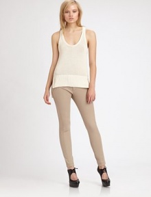 Polished chunky knit, in a perfect layering style accented by a rib-knit, vented hemline.ScoopneckSleevelessAsymmetrical vented, rib-knit hemlineRacerbackAbout 25 from shoulder to hem70% viscose/20% polyamide/10% silkDry cleanImported of Italian fabricModel shown is 5'7 (170cm) wearing US size small. Polished chunky knit, in a perfect layering style accented by a rib-knit, vented hemline.ScoopneckSleevelessAsymmetrical vented, rib-knit hemlineRacerbackAbout 25 from shoulder to hem70% viscose/20% polyamide/10% silkDry cleanImported of Italian fabricModel shown is 5'7 (170cm) wearing US size small.