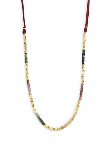 THE LOOKTourmaline detailsGoldplated nugget accentsFaux suede cord18k yellow goldplated brassTie closureTHE MEASUREMENTLength, about 36ORIGINMade in USA THE LOOKTourmaline detailsGoldplated nugget accentsFaux suede cord18k yellow goldplated brassTie closureTHE MEASUREMENTLength, about 36ORIGINMade in USA