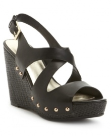Cinch up your seasonal look with the Morgan sandal by Tommy Hilfiger. The brand's preppy-chic vibe comes alive with a trendy elevated wedge and strappy vamp. Cinch up your seasonal look with the Morgan sandal by Tommy Hilfiger. The brand's preppy-chic vibe comes alive with a trendy elevated wedge and strappy vamp.