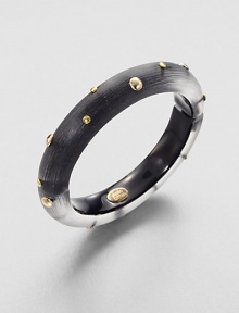 From the Lucite Collection. A sleek bangle of hand-sculpted, hand-painted Lucite, sprinkled with golden studs.LuciteGoldtoneDiameter, about 2½Width, about ½Hinged, with magnetic closureMade in USA From the Lucite Collection. A sleek bangle of hand-sculpted, hand-painted Lucite, sprinkled with golden studs.LuciteGoldtoneDiameter, about 2½Width, about ½Hinged, with magnetic closureMade in USA