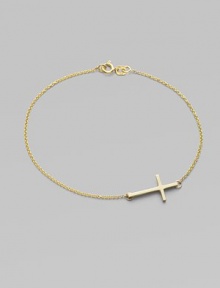 A gleaming 14k gold cross on a delicate chain.14k yellow gold Length, about 7 Pendant length, about ¾ Spring ring clasp Made in USA A gleaming 14k gold cross on a delicate chain.14k yellow gold Length, about 7 Pendant length, about ¾ Spring ring clasp Made in USA