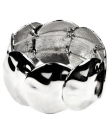 Get-up-and-go glam. The effortless stretch design on Nine West's polished bracelet style make it an effortless addition to your collection. A simple, yet stunning, overlapping circle pattern is crafted in imitation rhodium-plated mixed metal. Approximate diameter: 2-1/2 inches. Get-up-and-go glam. The effortless stretch design on Nine West's polished bracelet style make it an effortless addition to your collection. A simple, yet stunning, overlapping circle pattern is crafted in imitation rhodium-plated mixed metal. Approximate diameter: 2-1/2 inches.