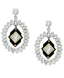 Add a little drama to your day. Juicy Couture's rhinestone earrings feature a cubic zirconia hanging at the center, surrounded by gold tones. Crafted in silver tone mixed metal. Approximate drop: 2-1/2 inches. Add a little drama to your day. Juicy Couture's rhinestone earrings feature a cubic zirconia hanging at the center, surrounded by gold tones. Crafted in silver tone mixed metal. Approximate drop: 2-1/2 inches.