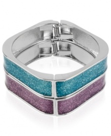 Double your pleasure. This pair of bangles from Betsey Johnson is crafted from rhodium-plated mixed metal with purple and teal glitter accents, as well as silver-tone details for a style infusion. Approximate diameter: 4 inches.