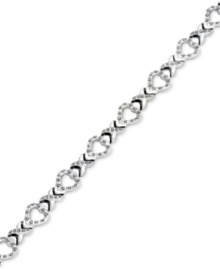 An excellent selection. This X link bracelet is crafted from platinum over sterling silver with diamond accents giving it a lustrous touch. Approximate length: 7-1/2 inches. Approximate width: 3/8 inch. An excellent selection. This X link bracelet is crafted from platinum over sterling silver with diamond accents giving it a lustrous touch. Approximate length: 7-1/2 inches. Approximate width: 3/8 inch.