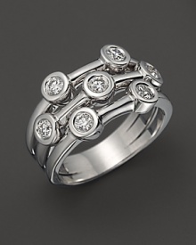 Seven sparkling diamonds, set in 18K. white gold, give the appearance of stacked rings. By Roberto Coin. Seven sparkling diamonds, set in 18K. white gold, give the appearance of stacked rings. By Roberto Coin.