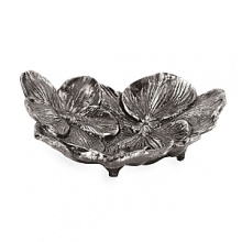 By interpreting plant forms in cast metal, Aram presents work which is evocative of a natural environment transformed and redefined. Says the designer, This collection was really born out of the sense I have of haute couture. There is a velvety luxury – an almost gothic quality – to representing orchids in blackened nickel. To me, the pieces feel seductive and graceful, yet dark and unexpected. By interpreting plant forms in cast metal, Aram presents work which is evocative of a natural environment transformed and redefined. Says the designer, This collection was really born out of the sense I have of haute couture. There is a velvety luxury – an almost gothic quality – to representing orchids in blackened nickel. To me, the pieces feel seductive and graceful, yet dark and unexpected.