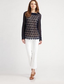 A beautifully intricate lace top with a sheer sleeve. Bateau neckLong lace sleevesSilk lined bodyPull-on styleAbout 24 from shoulder to hemCottonDry cleanImported Model shown is 5'9½ (176cm) wearing US size 4. A beautifully intricate lace top with a sheer sleeve. Bateau neckLong lace sleevesSilk lined bodyPull-on styleAbout 24 from shoulder to hemCottonDry cleanImported Model shown is 5'9½ (176cm) wearing US size 4.