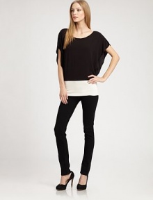 Colorblock jersey in an effortless dropped-shoulder style.BoatneckDropped shouldersDolman sleevesDropped waistbandAbout 26 from shoulder to hem94% rayon/6% spandexDry cleanMade in USAModel shown is 5'9 (175cm) wearing US size Small. Colorblock jersey in an effortless dropped-shoulder style.BoatneckDropped shouldersDolman sleevesDropped waistbandAbout 26 from shoulder to hem94% rayon/6% spandexDry cleanMade in USAModel shown is 5'9 (175cm) wearing US size Small.