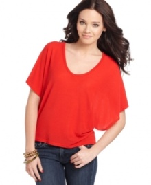 Spruce up your collection of basic tees with this style from Planet Gold that features dramatic batwing sleeves! Spruce up your collection of basic tees with this style from Planet Gold that features dramatic batwing sleeves!