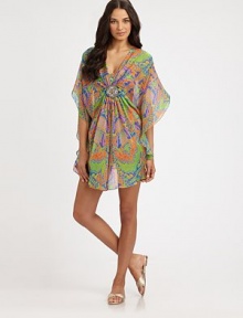 A breezy design with a stunningly vivid print and a glamorous, embellished detail at its flattering, gathered bodice. V-necklineFlutter sleevesEmbellished detail at gathered centerRuffle hemPull-on style80% polyamide/20% elastaneHand washImported A breezy design with a stunningly vivid print and a glamorous, embellished detail at its flattering, gathered bodice. V-necklineFlutter sleevesEmbellished detail at gathered centerRuffle hemPull-on style80% polyamide/20% elastaneHand washImported