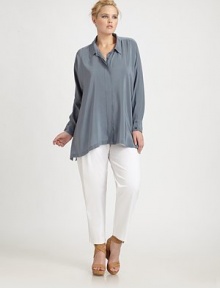Offering quintessential everyday luxury, this crepe de chine button-front design has a hidden pocket and a distinctly charming asymmetrical hem. Collar neckLong sleevesButton cuffsButton frontAsymmetrical hemAbout 30 from shoulder to hemSilkDry cleanImported Offering quintessential everyday luxury, this crepe de chine button-front design has a hidden pocket and a distinctly charming asymmetrical hem. Collar neckLong sleevesButton cuffsButton frontAsymmetrical hemAbout 30 from shoulder to hemSilkDry cleanImported