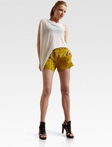 Featherweight jersey drapes from shoulder to hem in an asymmetrical tank.Draped necklineSleevelessAsymmetrical hemCut-out backAbout 38 from shoulder to hem82% polyester/18% cottonDry cleanImportedModel shown is 5'9½ (176cm) wearing US size Small. Featherweight jersey drapes from shoulder to hem in an asymmetrical tank.Draped necklineSleevelessAsymmetrical hemCut-out backAbout 38 from shoulder to hem82% polyester/18% cottonDry cleanImportedModel shown is 5'9½ (176cm) wearing US size Small.