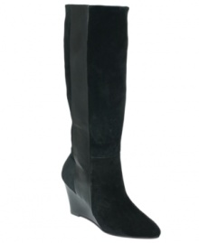 Cool combo. Paris Hilton's Kaori tall wedge boots feature a strip of leather that contrasts nicely against the suede shaft. Cool combo. Paris Hilton's Kaori tall wedge boots feature a strip of leather that contrasts nicely against the suede shaft.