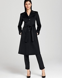 In a belted silhouette, Armani's cinched-waist coat lends a polished look in the warmest wool. In a belted silhouette, Armani's cinched-waist coat lends a polished look in the warmest wool.