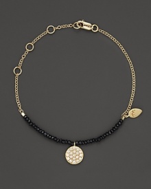 A diamond circle charm and black spinel gems great dramatic beauty on a 14K. yellow gold chain. By Meira T. A diamond circle charm and black spinel gems great dramatic beauty on a 14K. yellow gold chain. By Meira T.