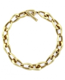 A traditional link to classic style. This golden link necklace from Vince Camuto features oblong links crafted in gold tone mixed metal, includes a toggle closure. Approximate length: 18 inches. A traditional link to classic style. This golden link necklace from Vince Camuto features oblong links crafted in gold tone mixed metal, includes a toggle closure. Approximate length: 18 inches.
