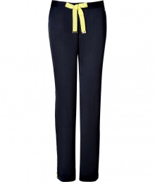Detailed in super soft navy tumbled satin, Juicy Coutures neon trimmed pants are a sporty choice as comfy as they are chic - Neon lime grosgrain drawstring with gold-toned logo engraved aglets, logo charm, neon lime side trim, slit ankles - Loose fit - Wear with a tissue tee, hoodie and shearling lined boots Detailed in super soft navy tumbled satin, Juicy Coutures neon trimmed pants are a sporty choice as comfy as they are chic - Neon lime grosgrain drawstring with gold-toned logo engraved aglets, logo charm, neon lime side trim, slit ankles - Loose fit - Wear with a tissue tee, hoodie and shearling lined boots