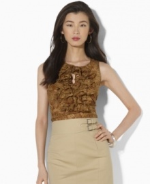 A cascade of ruffles and an eclectic pattern of earth-tone paisley impart easy elegance to Lauren by Ralph Lauren's sleeveless blouse in lightweight cotton voile. A cascade of ruffles and an eclectic pattern of earth-tone paisley impart easy elegance to Lauren by Ralph Lauren's sleeveless blouse in lightweight cotton voile.