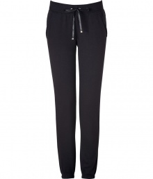 Perfect for pairing with sky-high heels, Juicy Coutures ultra comfy cuffed pants lends an edge of effortless feminine attitude to your outfit - Flat drawstring tie with gold-toned aglets, terry trimmed side slit pockets, fitted cuffs, sweatpant-style - Loosely fitted - Wear with a tee, boyfriend blazer and pumps Perfect for pairing with sky-high heels, Juicy Coutures ultra comfy cuffed pants lends an edge of effortless feminine attitude to your outfit - Flat drawstring tie with gold-toned aglets, terry trimmed side slit pockets, fitted cuffs, sweatpant-style - Loosely fitted - Wear with a tee, boyfriend blazer and pumps