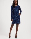 Chic mesh sheath, fully encrusted with shimmering sequins for evening elegance.Bateau neckline Long sleeves V'd back Back zipper Fully lined About 20 from natural waist Polyester; spot clean Imported