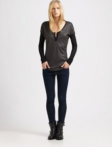 Buttery faux suede top with dropped shoulders, split scoopneck and contrasting knit trim. Split scoopneckDropped shouldersFaux suede frontLong knit sleevesSlightly curved hemAbout 25 from shoulder to hemBody: 97% modal/3% spandexTrim: Polyester faux suedeDry cleanMade in USA of domestic and imported fabricModel shown is 5'10 (177cm) wearing US size Small. Buttery faux suede top with dropped shoulders, split scoopneck and contrasting knit trim. Split scoopneckDropped shouldersFaux suede frontLong knit sleevesSlightly curved hemAbout 25 from shoulder to hemBody: 97% modal/3% spandexTrim: Polyester faux suedeDry cleanMade in USA of domestic and imported fabricModel shown is 5'10 (177cm) wearing US size Small.