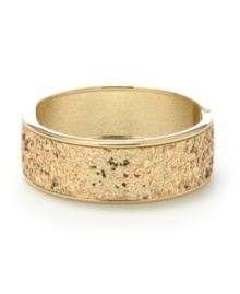 Worth its weight in gold. A glimmering glitter finish sets apart this stunning skinny bangle bracelet from Haskell. Crafted in gold tone metal with a hinge closure. Approximate length: 8 inches. Worth its weight in gold. A glimmering glitter finish sets apart this stunning skinny bangle bracelet from Haskell. Crafted in gold tone metal with a hinge closure. Approximate length: 8 inches.
