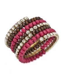 Glitz & glamour meet understated elegance. Add a two-dimensional accessory to your wardrobe with this INC International Concepts' coil bracelet. Featuring pink plastic rondells, glass rhinestone cupchain and wood beads, it's set in mixed metal with 12k gold plating. Bracelet stretches to fit wrist. Approximate diameter: 2-1/4 inches. Glitz & glamour meet understated elegance. Add a two-dimensional accessory to your wardrobe with this INC International Concepts' coil bracelet. Featuring pink plastic rondells, glass rhinestone cupchain and wood beads, it's set in mixed metal with 12k gold plating. Bracelet stretches to fit wrist. Approximate diameter: 2-1/4 inches.