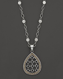John Hardy's Dot pendant necklace lends a modern look with a teardrop shaped, geometric design in 18K yellow gold and sterling silver. John Hardy's Dot pendant necklace lends a modern look with a teardrop shaped, geometric design in 18K yellow gold and sterling silver.