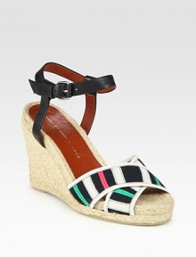 Multicolored grosgrain ribbon straps grounded by a classic espadrille wedge, finished with an adjustable leather ankle strap. Hemp wedge, 4 (100mm)Hemp platform, 1 (25mm)Compares to a 3 heel (75mm)Leather and grosgrain ribbon upperLeather lining and solePadded insoleImportedOUR FIT MODEL RECOMMENDS ordering one half size up as this style runs small. Multicolored grosgrain ribbon straps grounded by a classic espadrille wedge, finished with an adjustable leather ankle strap. Hemp wedge, 4 (100mm)Hemp platform, 1 (25mm)Compares to a 3 heel (75mm)Leather and grosgrain ribbon upperLeather lining and solePadded insoleImportedOUR FIT MODEL RECOMMENDS ordering one half size up as this style runs small.