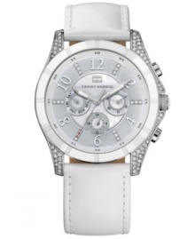 Pure, unadulterated craftsmanship from Tommy Hilfiger. Watch crafted of white leather strap and round stainless steel case embellished with crystal accents. White enamel bezel features stick markers. Silver tone chronograph textured dial features applied numerals, triple-crystal accent markers, three subdials, silver tone three hands and iconic flag logo at twelve o'clock. Quartz movement. Water resistant to 30 meters. Ten-year limited warranty. Pure, unadulterated craftsmanship from Tommy Hilfiger. Watch crafted of white leather strap and round stainless steel case embellished with crystal accents. White enamel bezel features stick markers. Silver tone chronograph textured dial features applied numerals, triple-crystal accent markers, three subdials, silver tone three hands and iconic flag logo at twelve o'clock. Quartz movement. Water resistant to 30 meters. Ten-year limited warranty.