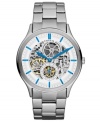 Get to the heart of the matter. This automatic watch from Fossil showcases its inner-workings with a skeleton dial and brings pop with cool blue accents.