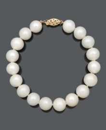 Embrace easy elegance with a simple strand of pearls. Bracelet features cultured freshwater pearls (10-11 mm) with a 14k gold clasp. Approximate length: 8 inches. Embrace easy elegance with a simple strand of pearls. Bracelet features cultured freshwater pearls (10-11 mm) with a 14k gold clasp. Approximate length: 8 inches.