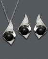 Add summer flair to your every day look. This shell-shaped jewelry set features a matching pendant and earrings accented by diamonds with a pretty onyx center (8 mm). Set in sterling silver. Approximate length: 18 inches. Approximate pendant drop: 7/8 inch. Approximate earrings drop: 3/4 inch.