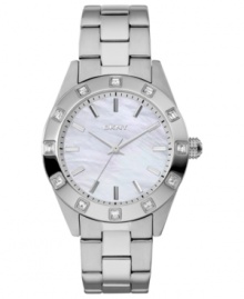 A classic, structured watch design from DKNY with a soothing mother-of-pearl dial. A classic, structured watch design from DKNY with a soothing mother-of-pearl dial.