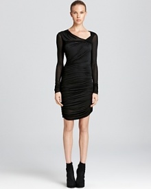 Helmut Lang's ruched dress boasts a form-fitting silhouette with flattering ruching. Helmut Lang's ruched dress boasts a form-fitting silhouette with flattering ruching.