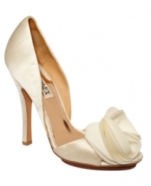 The night's just getting started. These gorgeous two-piece pumps by Badgley Mischka feature an elaborate silk flower detail on the toe. The night's just getting started. These gorgeous two-piece pumps by Badgley Mischka feature an elaborate silk flower detail on the toe.