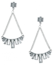 Chandelier chic from GUESS. These drop earrings flaunt baguette-cut crystal stones placed in a row, strung from linked chains. Crafted in imitation rhodium tone mixed metal. Approximate drop: 3 inches. Chandelier chic from GUESS. These drop earrings flaunt baguette-cut crystal stones placed in a row, strung from linked chains. Crafted in imitation rhodium tone mixed metal. Approximate drop: 3 inches.