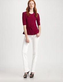 Ultra-soft cashmere cotton knit, in a snug-fitting style dressed up by a ruffled peplum.Rib-knit jewel necklineElbow length sleevesSignature detail at waistRuffled peplumPiping at seams50% cashmere/50% cottonDry cleanImportedModel shown is 5'10½ (179cm) wearing US size Small. Ultra-soft cashmere cotton knit, in a snug-fitting style dressed up by a ruffled peplum.Rib-knit jewel necklineElbow length sleevesSignature detail at waistRuffled peplumPiping at seams50% cashmere/50% cottonDry cleanImportedModel shown is 5'10½ (179cm) wearing US size Small.