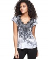 Add a little sizzle to your wardrobe with One World's embellished top! Pair with jeans for a relaxed, chic look.