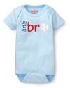 A light blue bodysuit touts a baseball accent for aspiring little athletes, from Sara Kety.