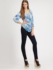 Fluid silk scoopneck with three-quarter sleeves, enlivened by a whimsical print and flattering self tie. ScoopneckThree-quarter sleevesButton frontDrawstring drop waistSilkDry cleanImportedModel shown is 5'10 (177cm) wearing US size 4. Fluid silk scoopneck with three-quarter sleeves, enlivened by a whimsical print and flattering self tie. ScoopneckThree-quarter sleevesButton frontDrawstring drop waistSilkDry cleanImportedModel shown is 5'10 (177cm) wearing US size 4.