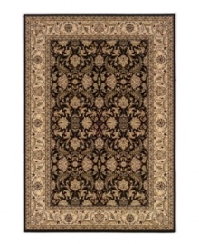 Pulling inspiration from the masterwork of 16th and 17th-century Persian artisans, this heirloom-quality rug adheres to centuries-old tradition with an unmatched beauty that still holds up today. An intricate, full-frame curvilinear pattern features swirling Arabesques and blossoms set in a rich palette of ebony and creme. Meticulously styled, the use of ultra-fine yarn allows for superb detail, crisp design and a soft hand. One-year limited warranty. Pulling inspiration from the masterwork of 16th and 17th-century Persian artisans, this heirloom-quality rug adheres to centuries-old tradition with an unmatched beauty that still holds up today. An intricate, full-frame curvilinear pattern features swirling Arabesques and blossoms set in a rich palette of ebony and creme. Meticulously styled, the use of ultra-fine yarn allows for superb detail, crisp design and a soft hand. One-year limited warranty.