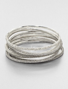 A set of seven pavé bangles in three sleek colors. GlassBrassDiameter, about 3.5Slip-on styleImported A set of seven pavé bangles in three sleek colors. GlassBrassDiameter, about 3.5Slip-on styleImported