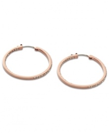 Non-stop glitz from Fossil. These classic hoop earrings embrace modern trends with rosy hues and pave crystal accents. Crafted in rose-gold tone mixed metal. Approximate diameter: 1-3/8 inches. Non-stop glitz from Fossil. These classic hoop earrings embrace modern trends with rosy hues and pave crystal accents. Crafted in rose-gold tone mixed metal. Approximate diameter: 1-3/8 inches.