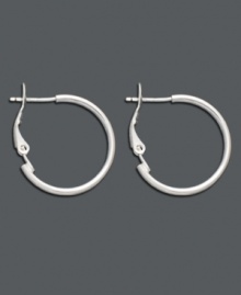 Spice up every ensemble with a simple pair of hoops. A stylish must-have for your accessory collection, these smooth sterling silver hoops feature a lever backing. Approximate diameter: 1 inch.