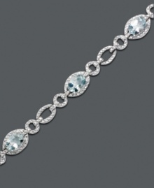 Inspired by crystal clear ocean waves. Luminous oval-cut aquamarine (5 ct. t.w.) shines as brightly as the diamond-accented oval links of this bracelet crafted from sterling silver. Approximate length: 7 inches. Inspired by crystal clear ocean waves. Luminous oval-cut aquamarine (5 ct. t.w.) shines as brightly as the diamond-accented oval links of this bracelet crafted from sterling silver. Approximate length: 7 inches.