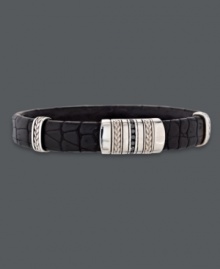 Sleek sophistication. This stylish men's cuff bracelet features a genuine crocodile band, sterling silver accents, and round-cut black diamonds (1/4 ct. t.w.). Approximate length: 8-1/2 inches. Approximate width: 1/2 inch. Sleek sophistication. This stylish men's cuff bracelet features a genuine crocodile band, sterling silver accents, and round-cut black diamonds (1/4 ct. t.w.). Approximate length: 8-1/2 inches. Approximate width: 1/2 inch.